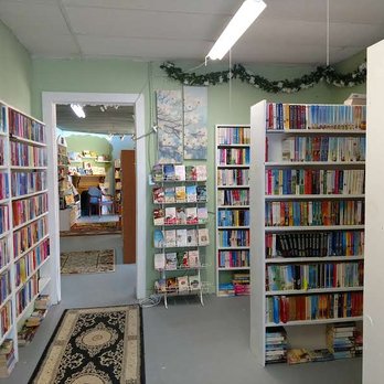 The Book Nook - Romance room, looking back through to the kids' room - Bookstores Near Me - Brenham, Texas