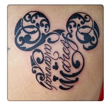 Calculated Punkture Studio - Mickey head with my children's names. Artist Christopher Juarez. - Piercing Near Me - Brentwood, California