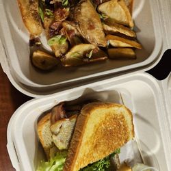 Craft 670 Restaurant & Bar - Chipotle chicken sandwich and fries with a side of queso