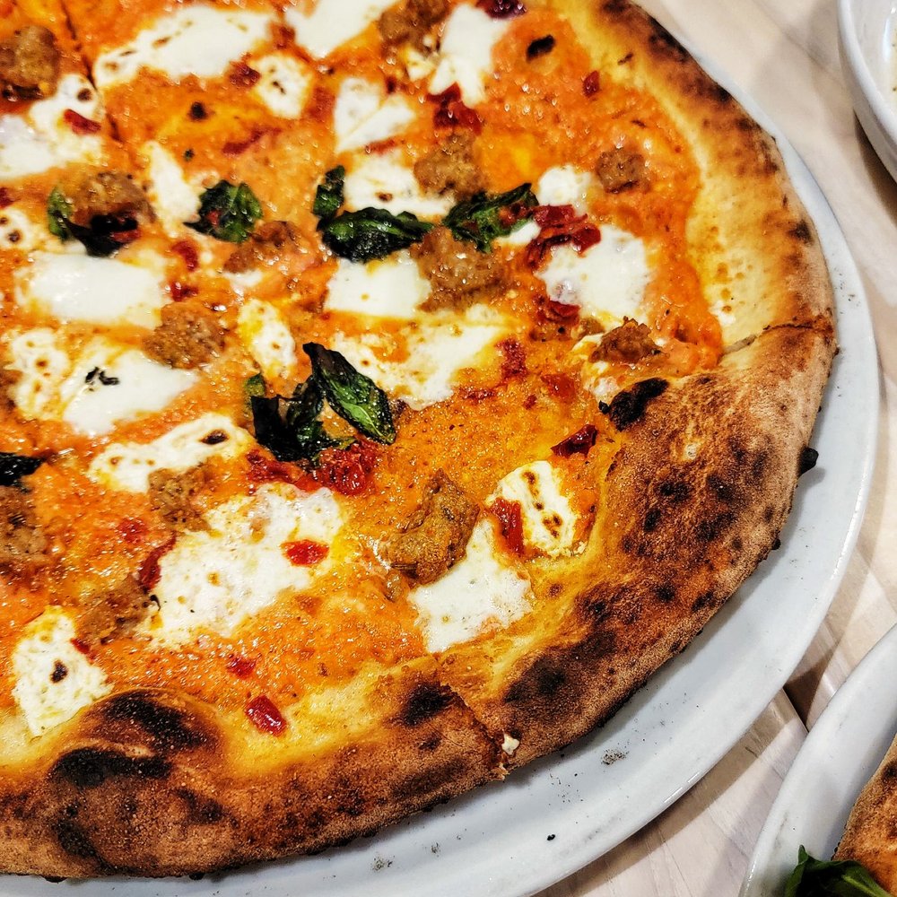 Char & Lemon - Alla Vodka pie: vodka sauce, housemade spicy italian sausage, calabrian chili, ricotta, basil - Italian Near Me - Oxford, Connecticut Char & Lemon - Alla Vodka pie: vodka sauce, housemade spicy italian sausage, calabrian chili, ricotta, basil - Italian Near Me - Oxford, Connecticut