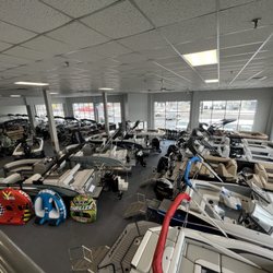 USA Marine - Climate Controlled Showroom with over 20 boats indoors year round