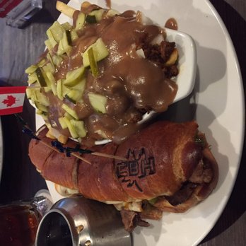 The Canadian Brewhouse - Beef dip with cheeseburger poutine. - Sports Bars Near Me - Calgary, Alberta The Canadian Brewhouse - Beef dip with cheeseburger poutine. - Sports Bars Near Me - Calgary, Alberta