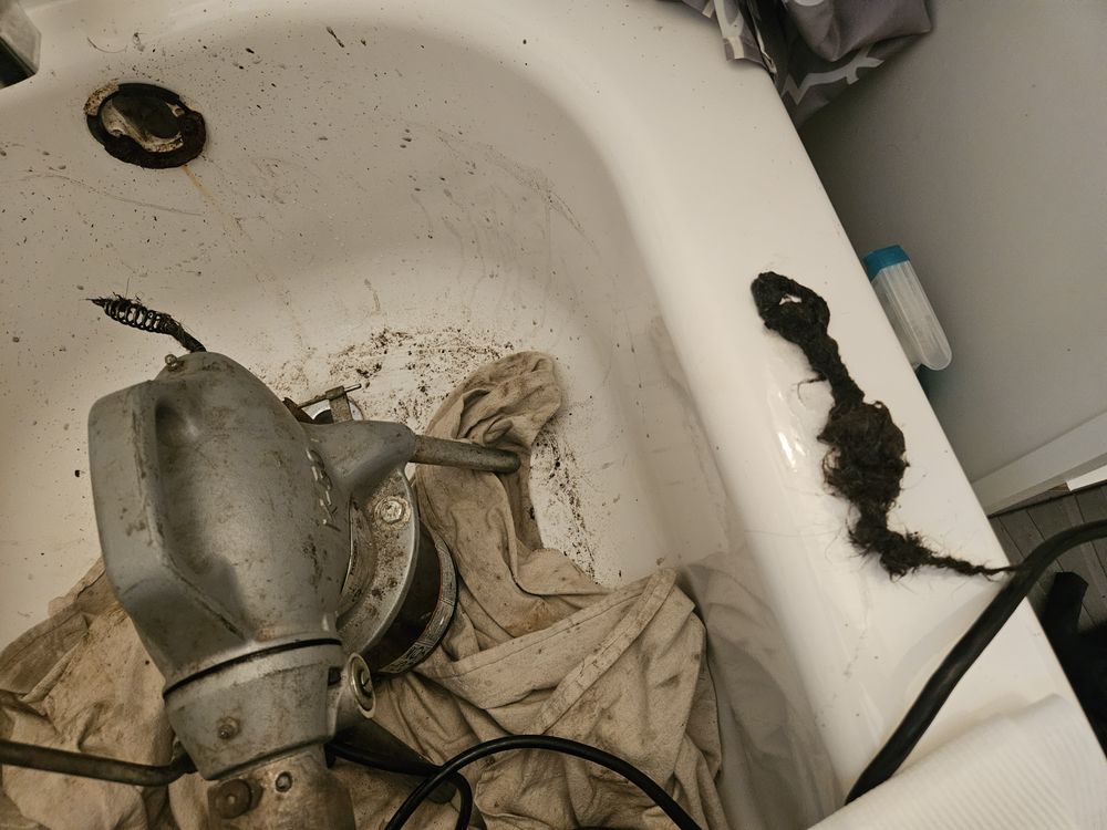 Slide of Angry Snake Drain Services