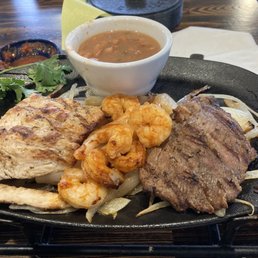 Don't be fooled by the steak and chicken being spread out. It was only 4 slices of each! Those was the sizzling fajita combo!