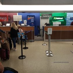 Budget Car Rental - A show of the airport Budget, with a line of more than15 people behind me,waiting. I couldn't show their faces, due to privacy.