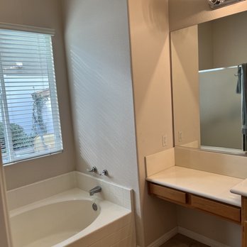 RLR Home Construction - Before - tub and vanity with a bump out in the corner (we removed the bump out) - General Contractors Near Me - Corona, California