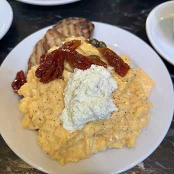 Buvette - Steamed eggs with cheese and sun dried tomatoes on sour dough toast - French Near Me - New York, New York