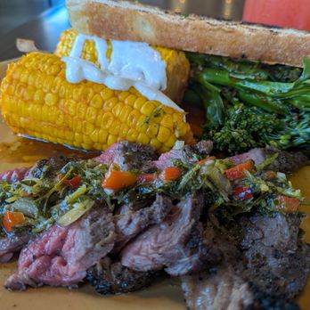 Urban Plates - Chimichurri steak with corn & sesame broccolini - New American Near Me - Long Beach, California Urban Plates - Chimichurri steak with corn & sesame broccolini - New American Near Me - Long Beach, California