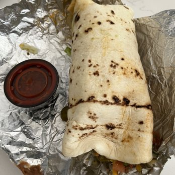 Vasquez Deli - Carnitas burrito. I turn this into a super burrito. Cost went up $6 MORE, not worth it. - Mexican Near Me - Vacaville, California Vasquez Deli - Carnitas burrito. I turn this into a super burrito. Cost went up $6 MORE, not worth it. - Mexican Near Me - Vacaville, California