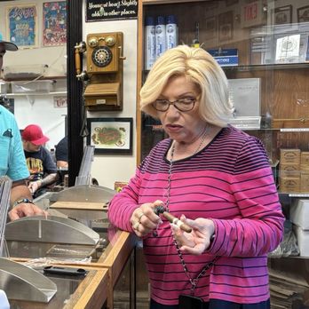 El Titan de Bronze - Sandra getting my sample ready for me - Tobacco Shops Near Me - Miami, Florida El Titan de Bronze - Sandra getting my sample ready for me - Tobacco Shops Near Me - Miami, Florida