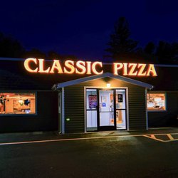 Classic Pizza & Family Restaurant - Outside view of Classic Pizza at night