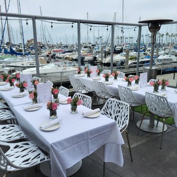 Sea Level Restaurant & Lounge - Beautiful set up by the staff of Sea Level Lounge. Flowers by Maggie's Flower Shop. - New American Near Me - Redondo Beach, California Sea Level Restaurant & Lounge - Beautiful set up by the staff of Sea Level Lounge. Flowers by Maggie's Flower Shop. - New American Near Me - Redondo Beach, California