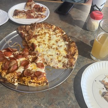Mountain Mike's Pizza - Medium pizza half pepperoni half cheese and imported beer. - Pizza Near Me - Bakersfield, California