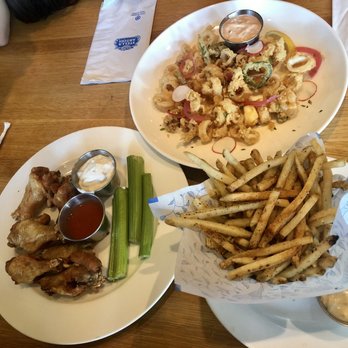 Earls Kitchen + Bar - Truffle Fries, Chipotle Calamari and Chicken - New American Near Me - Somerville, Massachusetts