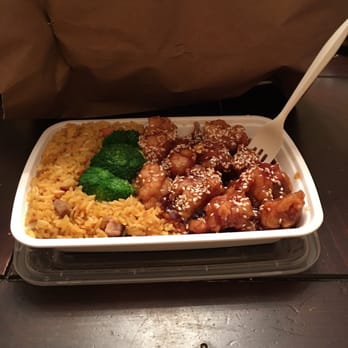 Green Tea - Seasame chicken with pork fried rice! (With a couple bites of chicken already missing) - Chinese Near Me - Jacksonville, Florida