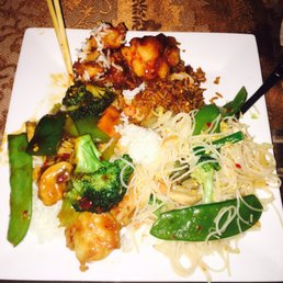 General Tso's Chicken (top of plate), Fried Rice underneath, Chow Mein Fun (noodles), and Hunan Shrimp (left side of the plate) General Tso's Chicken (top of plate), Fried Rice underneath, Chow Mein Fun (noodles), and Hunan Shrimp (left side of the plate)