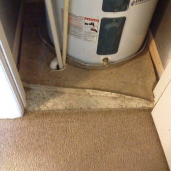 Ansley Place Apartments - Linoleum buckling in water heater closet from outside flooding. - Apartments Near Me - Houma, Louisiana