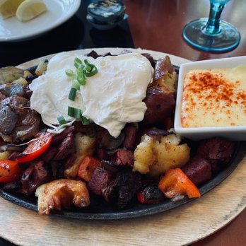 Shaker + Spear - In house corned beef hash eggs Benedict with hollandaise on the side - Seafood Near Me - Seattle, Washington Shaker + Spear - In house corned beef hash eggs Benedict with hollandaise on the side - Seafood Near Me - Seattle, Washington