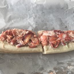 a lobster sandwich on a piece of wax paper