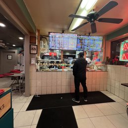 a man standing at the counter