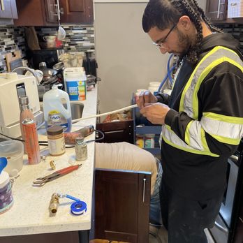 C Williams Plumbing - Usama installing my water filter in my messy kitchen. - Plumbing Near Me C Williams Plumbing - Usama installing my water filter in my messy kitchen. - Plumbing Near Me