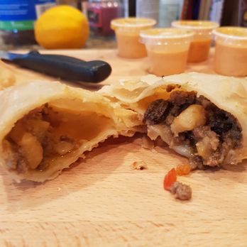 The Cuban Hut - Beef Empanadas. It was good but notice how one side is empty. :( - Cuban Near Me - Temecula, California The Cuban Hut - Beef Empanadas. It was good but notice how one side is empty. :( - Cuban Near Me - Temecula, California