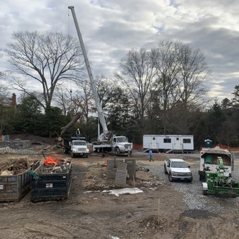 GA Tree Service - a construction site with trucks and a crane - Landscaping Near Me - Norwalk, Connecticut GA Tree Service - a construction site with trucks and a crane - Landscaping Near Me - Norwalk, Connecticut