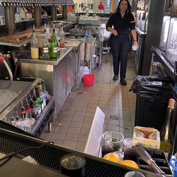 Ember - Knife on the floor that they use to cut limes and lemons and oranges. - American Near Me - Houston, Texas