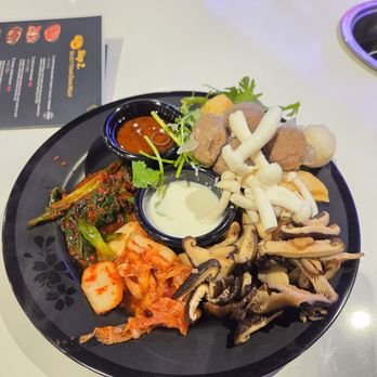 Shabu Zone - Plate of mushrooms, kimchi and meatballs - Hot Pot Near Me - Federal Way, Washington Shabu Zone - Plate of mushrooms, kimchi and meatballs - Hot Pot Near Me - Federal Way, Washington