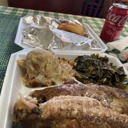 Baked turkey wings, collard greens, and cornbread dressing