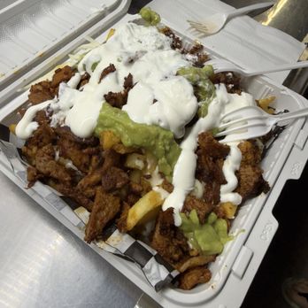 Brother's Tacos - Al pastor fries were amazing. Even though there's delicious meat and sauce smothering the fries they stayed crispy the entire meal. - Tacos Near Me - Huntington Beach, California Brother's Tacos - Al pastor fries were amazing. Even though there's delicious meat and sauce smothering the fries they stayed crispy the entire meal. - Tacos Near Me - Huntington Beach, California
