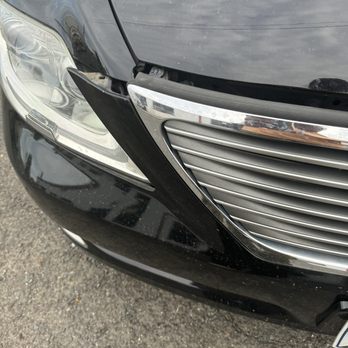 Aardwolf Parking JFK - Bumper damage on right - Parking Near Me - Jamaica, New York