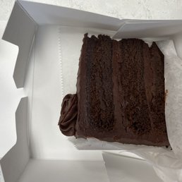 A slice of chocolate cake - rich and delicious A slice of chocolate cake - rich and delicious