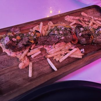 Aura Bar & Kitchen - Ribeye Steak and Fries - Mediterranean Near Me - New York, New York