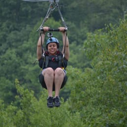 Zip-lining on a Mountain was amazing. Feeling the breeze, enjoying the trees and watching over the lake was breathtaking. Zip-lining on a Mountain was amazing. Feeling the breeze, enjoying the trees and watching over the lake was breathtaking.