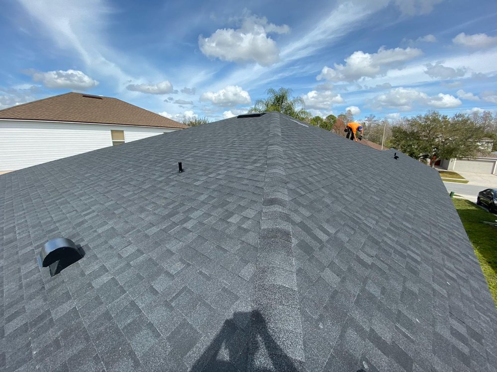 Slide of A2M Roofing