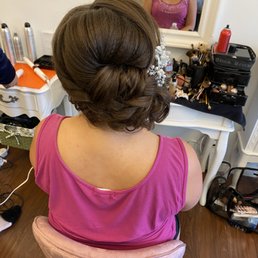 Trail photo of hair and make up. Also utilizing one of their great rental hair pieces.