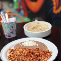 Frida Café Bar - Eggs with chorizo accompanied with flour and corn tortillas