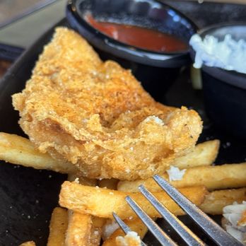 Tidal Raves Seafood Grill - Fish and chips- what's left of them! Jumped right into eating!! - New American Near Me - Depoe Bay, Oregon
