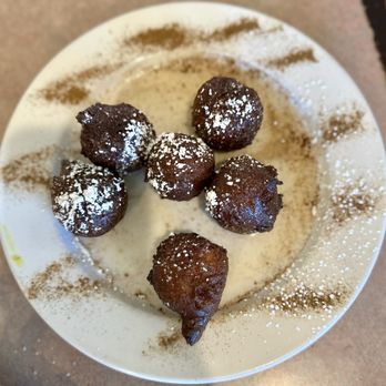 Russell's Marina Grill - Beignet balls - Breakfast & Brunch Near Me - New Orleans, Louisiana Russell's Marina Grill - Beignet balls - Breakfast & Brunch Near Me - New Orleans, Louisiana