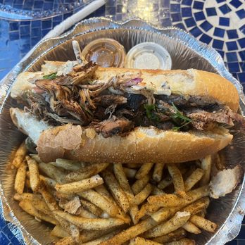 Jerk Shack Kitchen - Fry bake jerk chicken sandwhich - Caribbean Near Me - Seattle, Washington