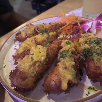 Travesias - Coconut Shrimp appetizer light crispy and melt in your mouth delicious - Latin American Near Me - Bronx, New York Travesias - Coconut Shrimp appetizer light crispy and melt in your mouth delicious - Latin American Near Me - Bronx, New York