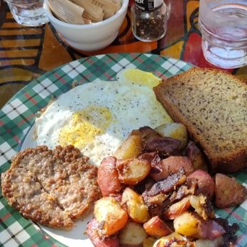 Blue Heaven - Yummy breakfast of eggs, banana bread, home fries and spicy sausage. - Breakfast & Brunch Near Me - Key West, Florida Blue Heaven - Yummy breakfast of eggs, banana bread, home fries and spicy sausage. - Breakfast & Brunch Near Me - Key West, Florida