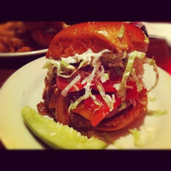 Redcoat Tavern - Piedmontese with cheddar, grilled onions, lettuce & tomato. Forgot to tell them to hold the mayo & add Zip Sauce - Bars Near Me - Royal Oak, Michigan