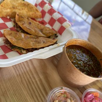 Los Cactus - Birrira Tacos with Consume and side condiments (corn, picked res onions, sliced cucumbers) - Mexican Near Me - Columbia Heights, Minnesota