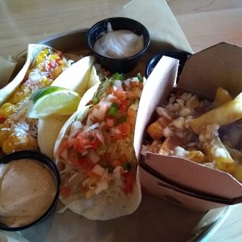 Streats Kanata Kitchen - 2 tacos combo, sauces on the side $13 (mango shrimp and Baja fish, mini poutine), comes with a drink. - Fast Food Near Me - Ottawa, Ontario Streats Kanata Kitchen - 2 tacos combo, sauces on the side $13 (mango shrimp and Baja fish, mini poutine), comes with a drink. - Fast Food Near Me - Ottawa, Ontario