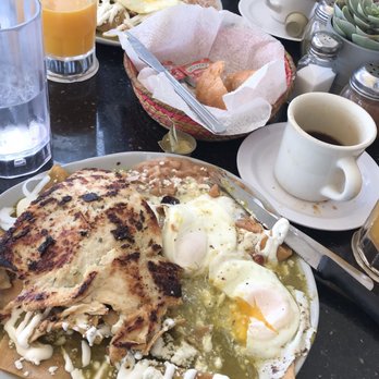 Potzolcano - Green Chile chicken and egg chilaquiles. - Mexican Near Me - Santa Ana, California