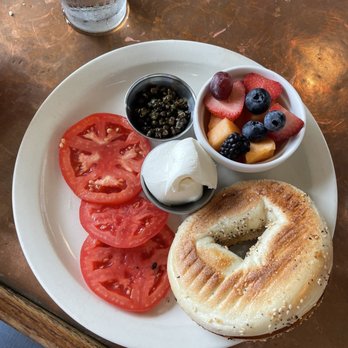 Station 400 - Everything bagel with plain cream cheese, tomato, capers - fruit cup. Really delicious. - American Near Me - Sarasota, Florida