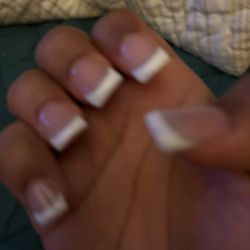 Allure Nails - This is what she gave me horrible it's nice. She didn't even put any designs on it or nothing. She turned my cuticles black.