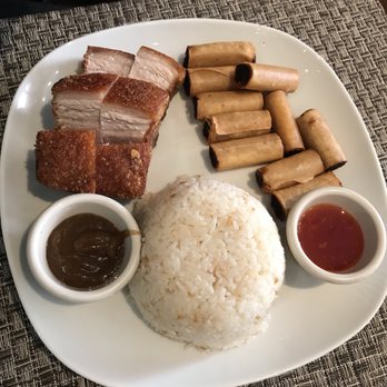 Grill 21 - Platter with lumpia and fried pork belly with garlic rice. Get the fried pork belly! - Filipino Near Me - New York, New York